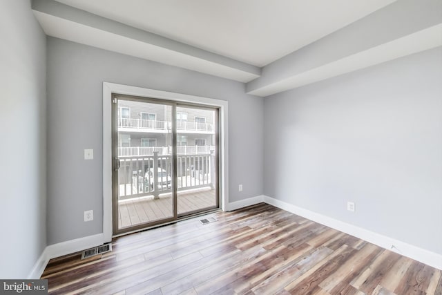 empty room featuring light hardwood / wood-style floors