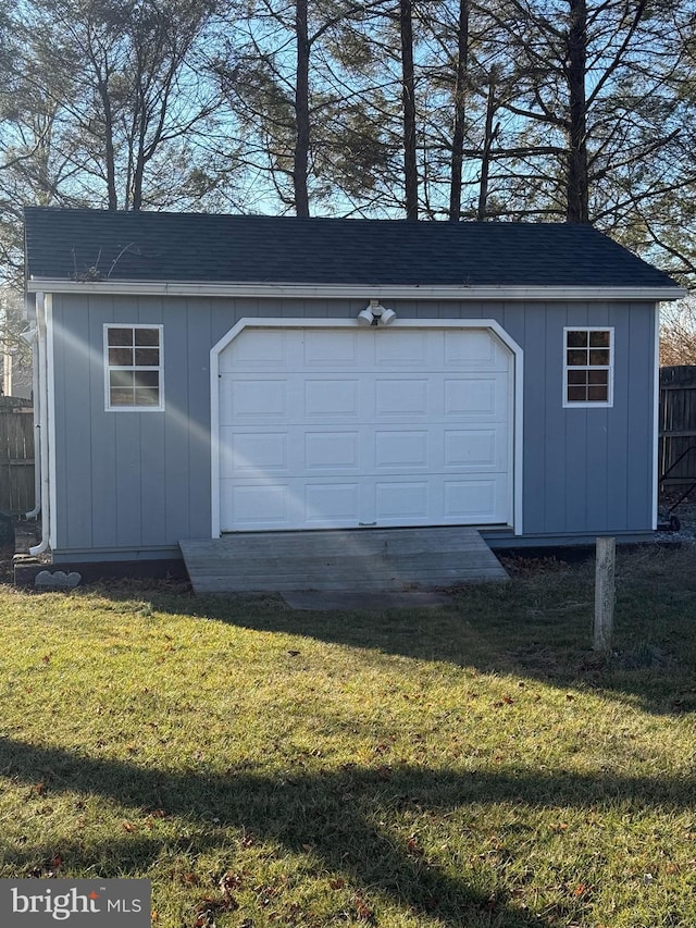 garage with a lawn