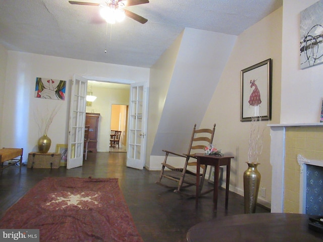 dining room with dark wood-type flooring, ceiling fan, and french doors