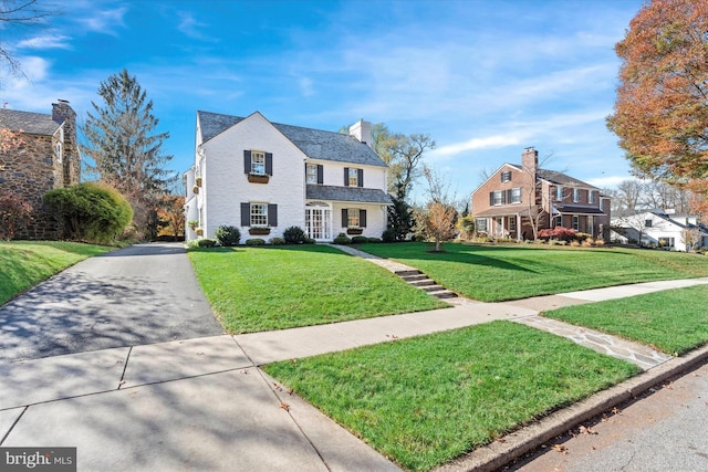 colonial house with a front yard