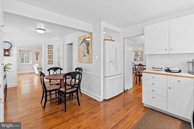 dining room featuring light hardwood / wood-style floors