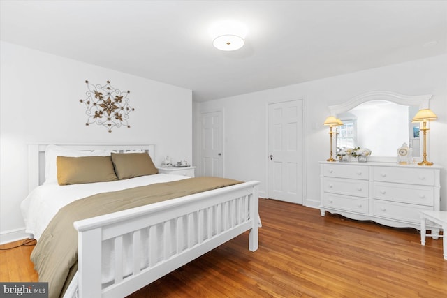 bedroom featuring hardwood / wood-style flooring