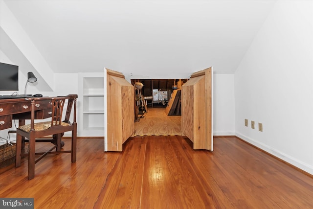 office space with hardwood / wood-style floors