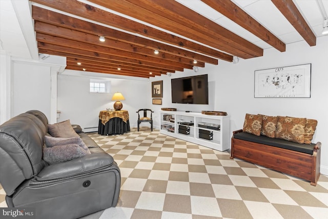 living room featuring beamed ceiling and a baseboard heating unit