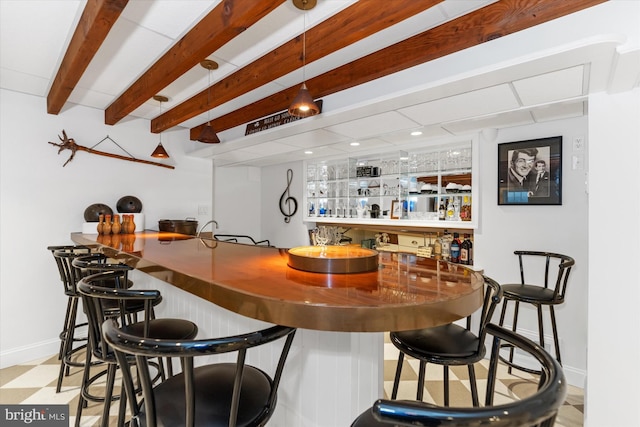 bar featuring beam ceiling