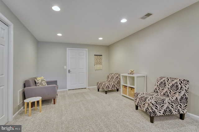 living area with carpet floors