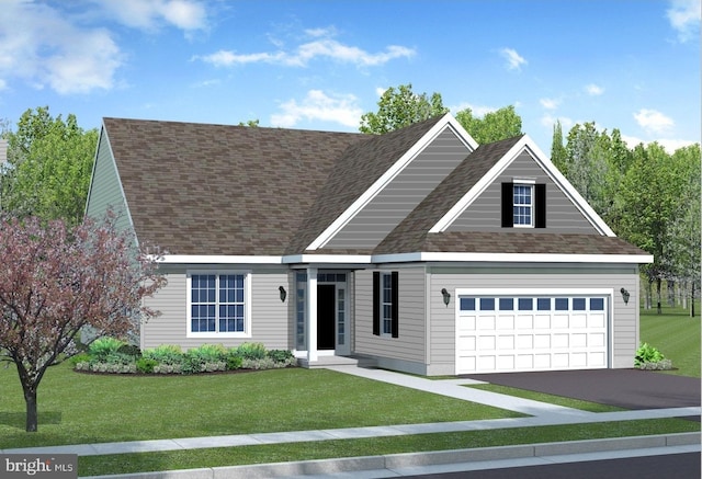 view of front of home featuring a garage and a front lawn