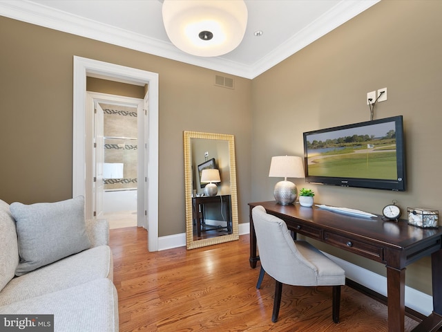 office space with crown molding and wood-type flooring