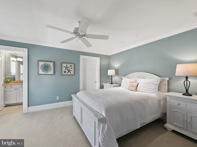 bedroom with connected bathroom, crown molding, light colored carpet, and ceiling fan