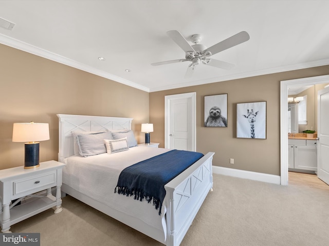 bedroom featuring ornamental molding, light carpet, and ensuite bathroom