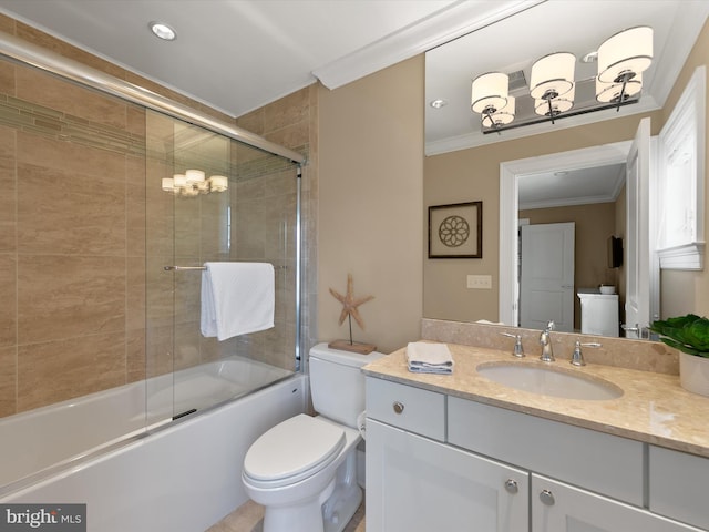 full bathroom featuring vanity, ornamental molding, toilet, and combined bath / shower with glass door