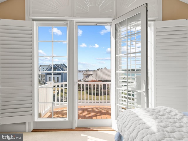 bedroom featuring access to outside