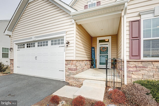 property entrance featuring a garage