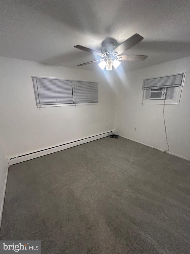 carpeted spare room featuring baseboard heating, ceiling fan, and a wall mounted AC