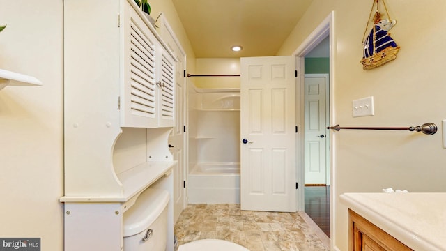 full bathroom with toilet, recessed lighting, and vanity