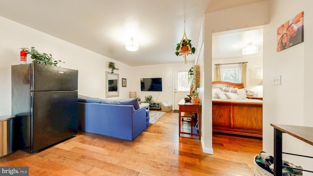living area with wood finished floors