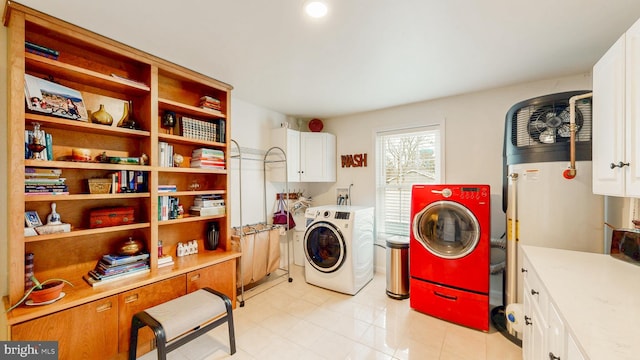 laundry room featuring cabinet space and washer and dryer