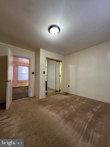 empty room with carpet floors