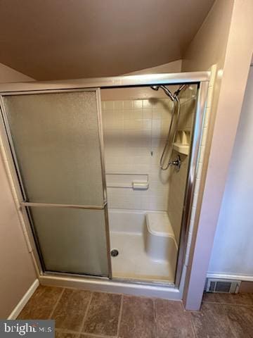 bathroom with an enclosed shower