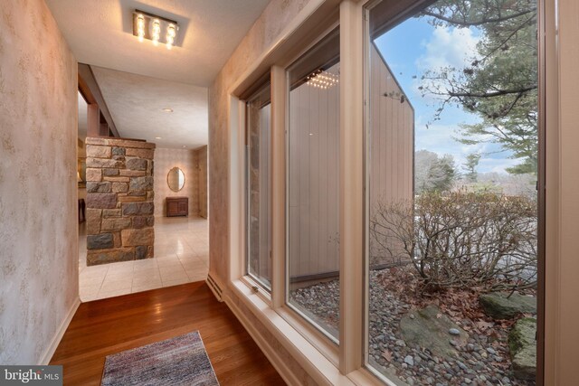 hall featuring wood finished floors