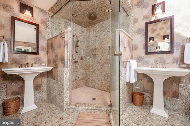 full bath with a shower stall