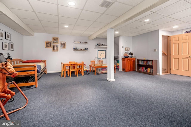 game room featuring recessed lighting, baseboards, visible vents, and a drop ceiling