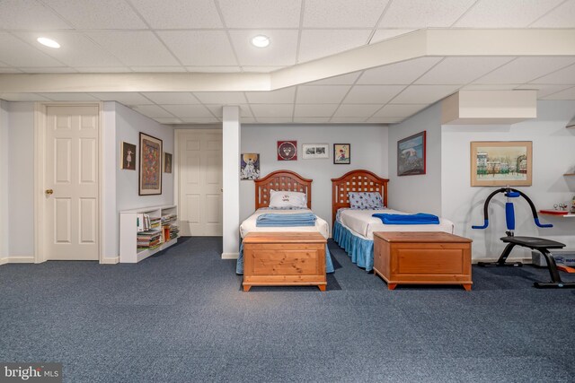 carpeted bedroom featuring baseboards and recessed lighting