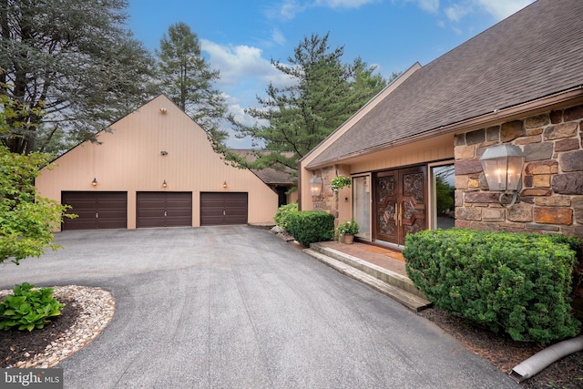 exterior space featuring stone siding