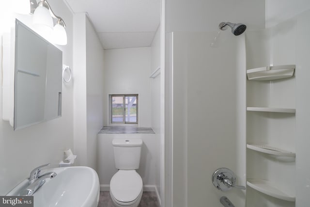 full bathroom featuring shower / washtub combination, toilet, and sink