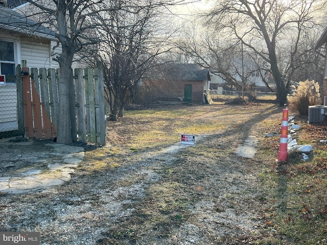 view of yard featuring central AC unit