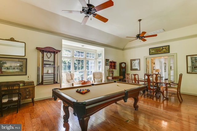 rec room featuring crown molding, lofted ceiling, pool table, and light wood-type flooring