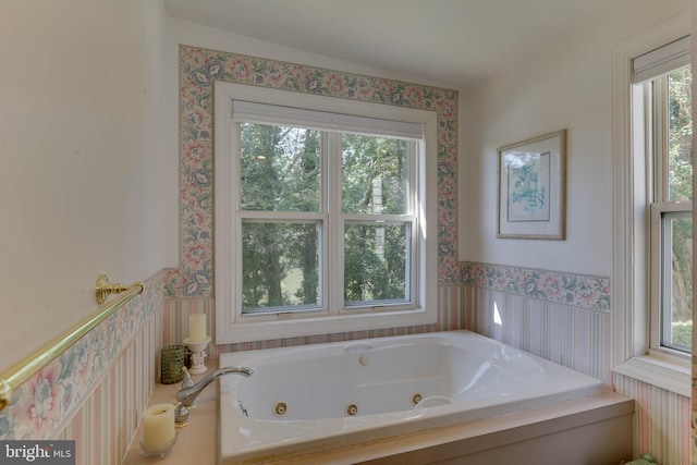 bathroom featuring a washtub