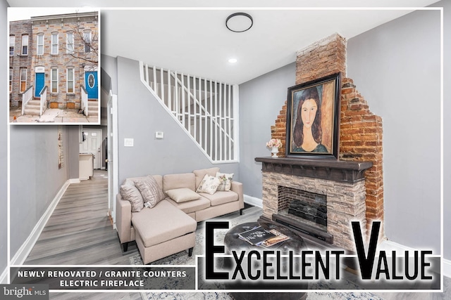 living room featuring hardwood / wood-style floors and a fireplace