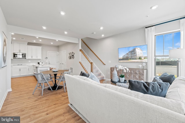 living room with light hardwood / wood-style floors