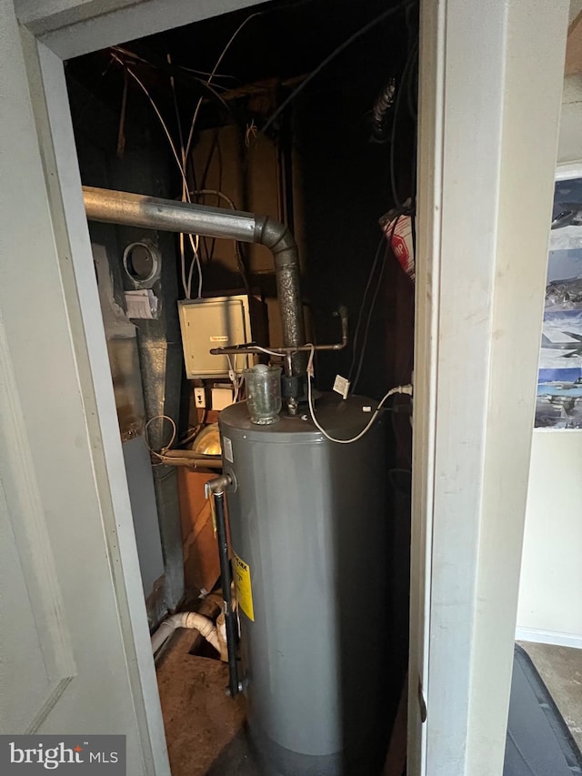 utility room featuring gas water heater