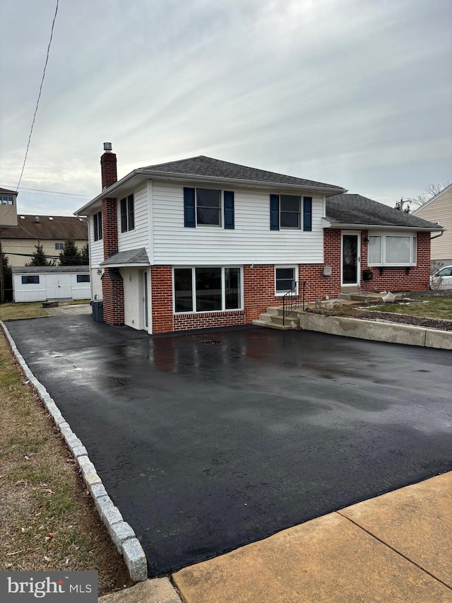 split level home with a garage