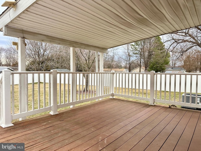 wooden terrace featuring central AC unit