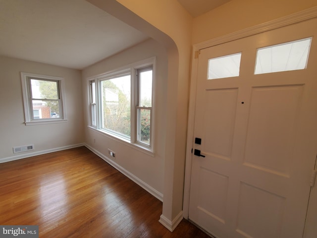 entryway with hardwood / wood-style flooring