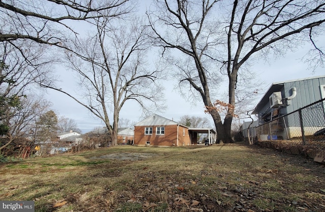 view of yard featuring a carport