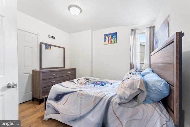 bedroom featuring light hardwood / wood-style flooring