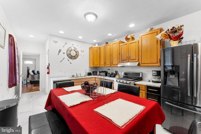 kitchen featuring appliances with stainless steel finishes and sink