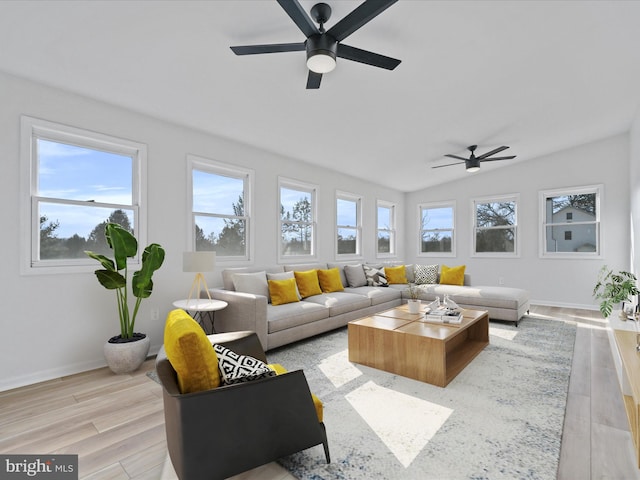 sunroom with ceiling fan and a wealth of natural light