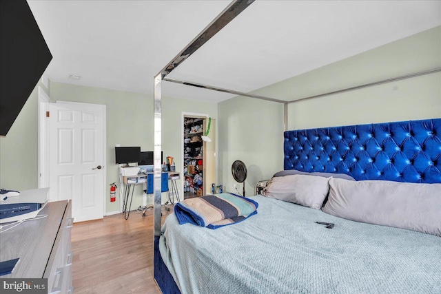 bedroom with light wood-type flooring