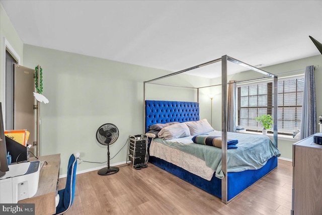 bedroom featuring hardwood / wood-style flooring