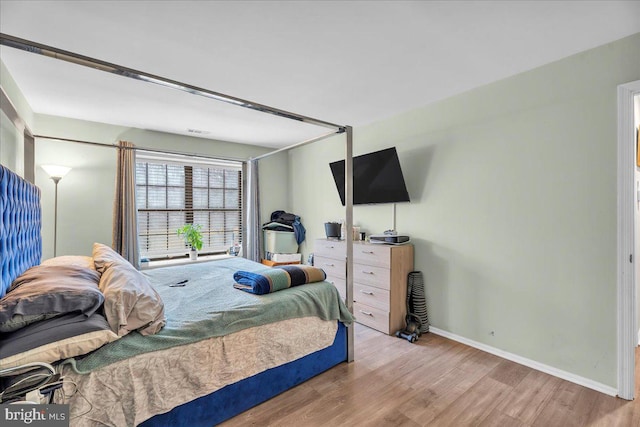 bedroom featuring light hardwood / wood-style floors