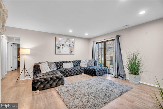 living room featuring light wood-type flooring