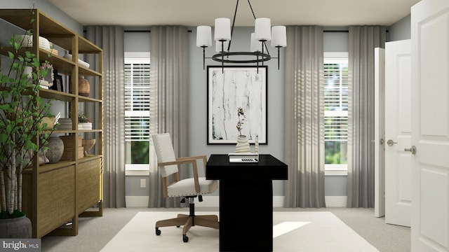 office area featuring light colored carpet and a chandelier