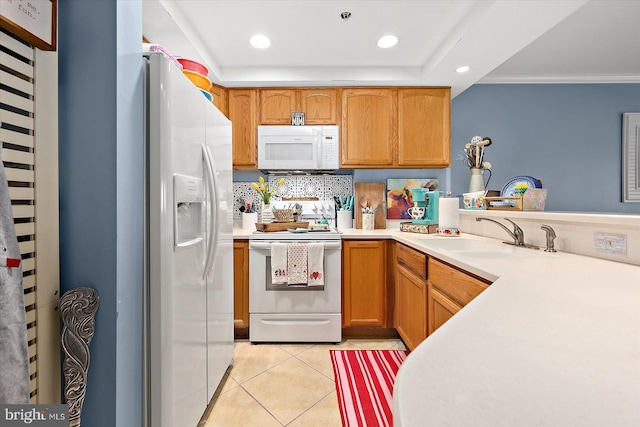 kitchen featuring light tile patterned flooring, tasteful backsplash, sink, ornamental molding, and white appliances