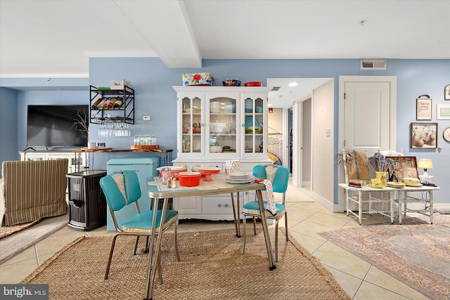 dining room featuring light tile patterned floors