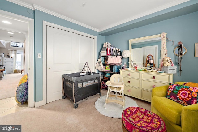 recreation room featuring ornamental molding and light carpet